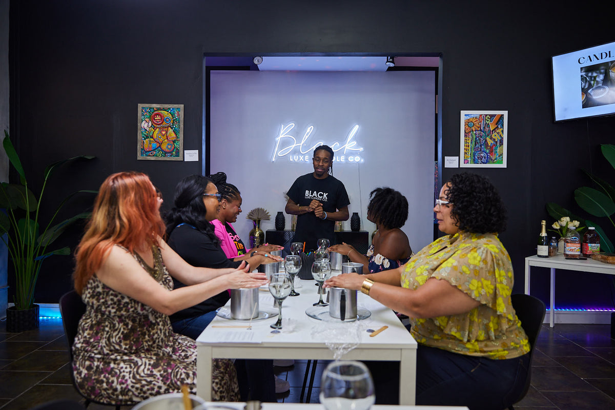 Guests enjoying candle making at Black Luxe